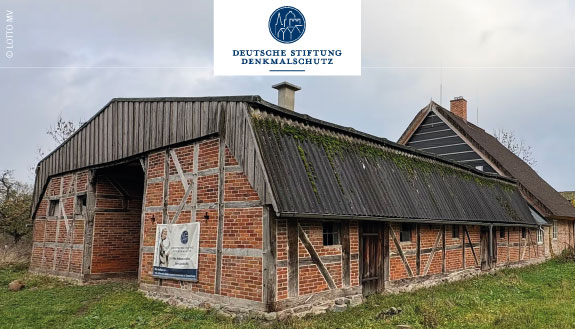 Au&szlig;enaufnahme das Fachhallenhauses Hufe VII in Gro&szlig; Neuleben