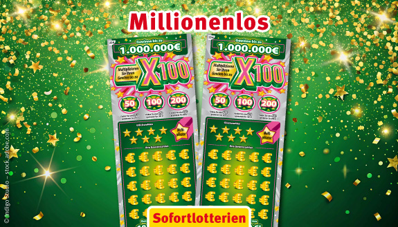 Buntes Rubbellos X100 umgeben von goldenem Glitzer auf gr&uuml;nem Hintergrund